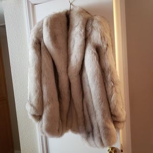 Medium length blue fox fur coat